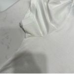  Tee Only worn once, looks and feels brand new. All tags still attached. Elevate your casual wardrobe with this Moncler white t-shirt. Photo 10