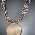 Coldwater Creek 6 strand multi colored seed bead necklace wood/bronze pendant Photo 3