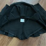 Black pleated skirt with shorts Size M Photo 2