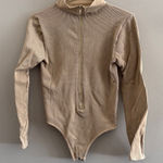 Pretty Little Thing Long Sleeve Tan Ribbed Bodysuit Photo 0
