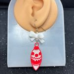 Red and White Bow Christmas Ornament Earrings Photo 1