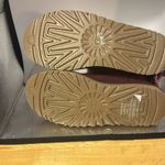UGG  snow boots size women’s five. Absolutely adorable burgundy color with bows.​ Photo 4