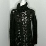 Hunter Sleeping on snow/ Green sweater dress Photo 0