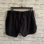 Adidas Women’s black 3 stripe lined 4” athletic shorts Large Photo 1