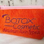 Botox Cosmetic Orange Terrycloth Embroidered Makeup Bag Photo 0