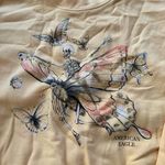 American Eagle Outfitters Yellow Graphic Sweater Photo 1