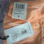 We Wore What  Solid Lace Up Biker in Peach Cobbler Photo 14