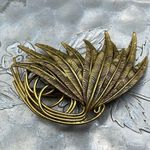 Vintage large ornate plume brooch . Antique brass finish . Gold Photo 0