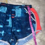 Under Armour graphic print running shorts sz medium Photo 6