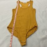 Heart & Hips Mustard Yellow Bodysuit women’s size small Photo 3