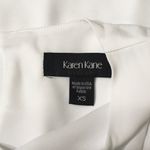 Karen Kane  asymmetrical white blouse. NWOT Photo 6