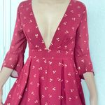 NLW Cherry Maroon Bell Sleeve Low Cut Mini Dress Photo 0