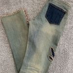 Bebe RARE  Bootcut crochet jeans Photo 1