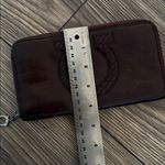 Salvatore Ferragamo  Brown embossed logo Leather Wallet full
Size Photo 8