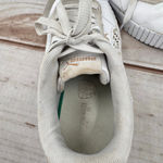 Puma  Carina 2.0 Laser Cut Flowers Sneakers White Gold Logos Athletic Feminine 7 Photo 7