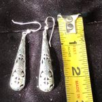 Silver Dangling Etched & Cutout Earrings Photo 5