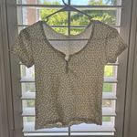 Brandy Melville John Galt  Tee Photo 1