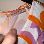 Skylar Rose Vibrant Floral Bodysuit in Orange and Purple Photo 2