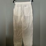 Alo Yoga NWT  Cloud Nine Pants white Size XS With Pockets Photo 3