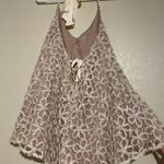 Prómesa Romper Photo 1