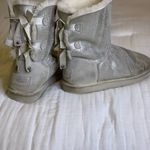 UGG  Bailey Bow Silver Sequin Boots Women’s 10 Photo 1