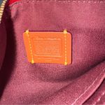 Coach x Disney Minnie Mouse Small Wristlet With Motif Photo 5