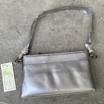 90s style purse Fits over the shoulder very cute silver color Photo 0