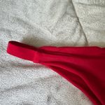 red bikini set with braided design on top Photo 6