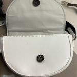 Kendall + Kylie Black and White Crossbody Bag with Semi-Circular Design Photo 5