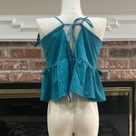 Romeo + Juliet Couture  turquoise ruffled crop top with lace up back / M … Photo 11