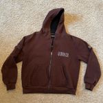 Menace Brown Embroidered Logo Hoodie Photo 0