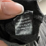 POL Washed Black Ultra-soft Boho Baby Doll Deep V Neck Lace Detail High Low Top Photo 7