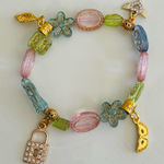 Colorful Charm Bracelet with Gold Accents Photo 0