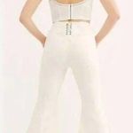 Free People we the free Crvy Super High Rise Lace Up super flare Jeans size 34 Photo 1