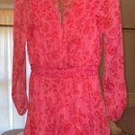 Francesca's  pink long sleeve floral romper Photo 1