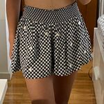 PINK - Victoria's Secret PINK Daisy Black Gangnam Shorts Photo 0