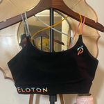 Peloton  Women’s Black Logo Sports Bra with Colorful Criss Cross Straps Active Photo 0