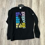 Nike  long sleeve sweatshirt Bold multicolor graphic on front. Comfortable crewneck design. Perfect for casual wear. Photo 3