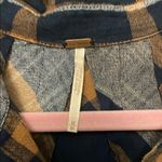 Free People  Blue and Brown Plaid Button Down Shirt with Ruffled Hem Photo 1