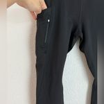 Athleta high traverse tight leggings in black pockets women’s size S high rise Photo 1