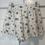 Threads of Luxx Blue Floral Women's Shorts with ruffled edge size medium. White Photo 3