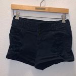 Blue Spice black 5/6 distressed triple button jean shorts Photo 0