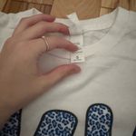 Boutique  T-Shirt Photo 1