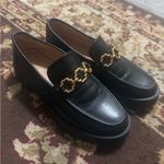 Sam & Libby  Black Leather Loafers with Gold Chain Detail Photo 1