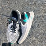 Nike white and black running sneakers Photo 1