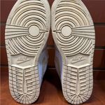 Nike  Pink and White Sneakers with Gold Accents Photo 3