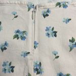 We Wore What Revolve  Ivory Blue Floral Cut Out Belted Mini Denim Skirt Large NWT Photo 8