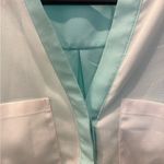 Ivanka Trump Banana Republic Black and White Sleeveless Button Down Blouse Photo 2