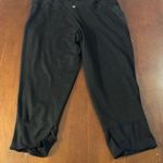 Tangerine  ladies capri tights are a size small. Photo 0