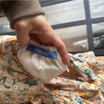 Tuckernuck Ella Blu eyelet floral smocked mini dress tiered ruffle sleeveless marigold Photo 3